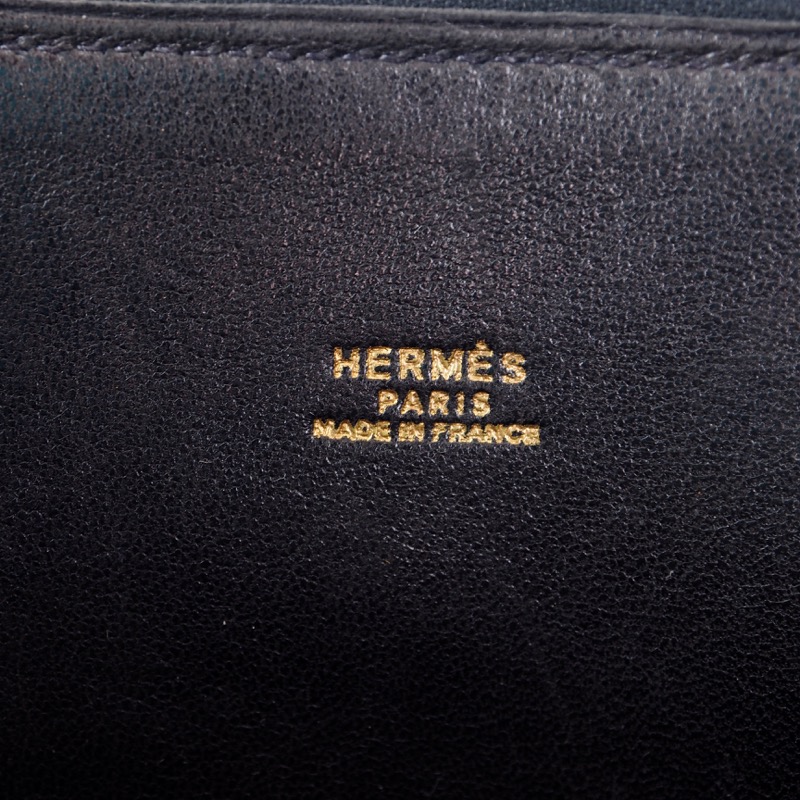 Lot - HERMES BLACK CALF BOX LEATHER BOLIDE BAG, 1991 8 1/4 x 10 1/4 x 4 in.  (21 x 26 x 10.2 cm.)
