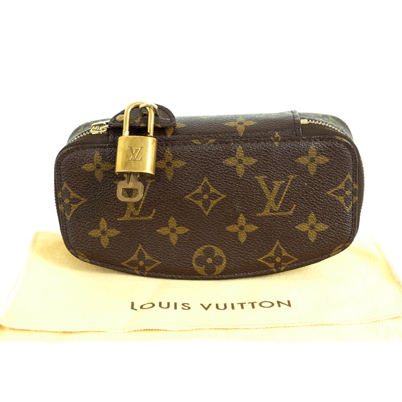 Louis Vuitton, a monogram canvas, jewellery box 'Poche Monte-Carlo